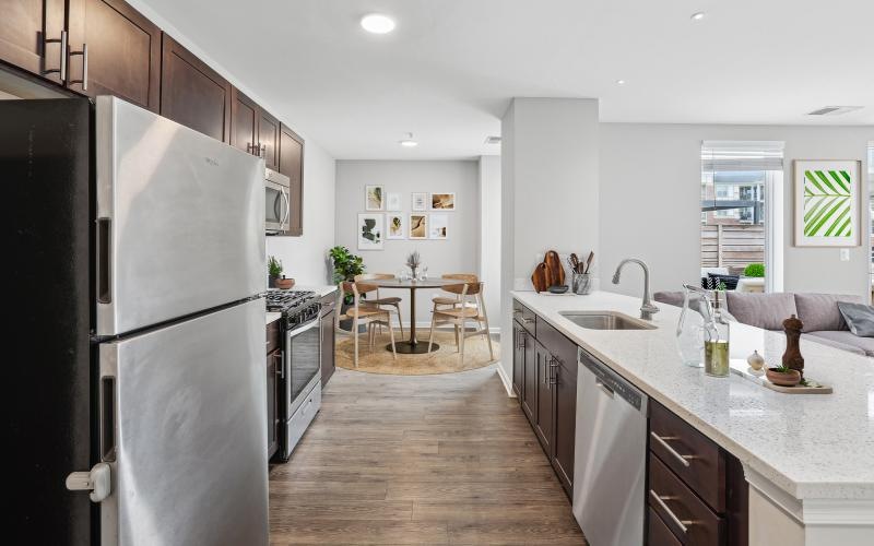 a kitchen with a marble counter top