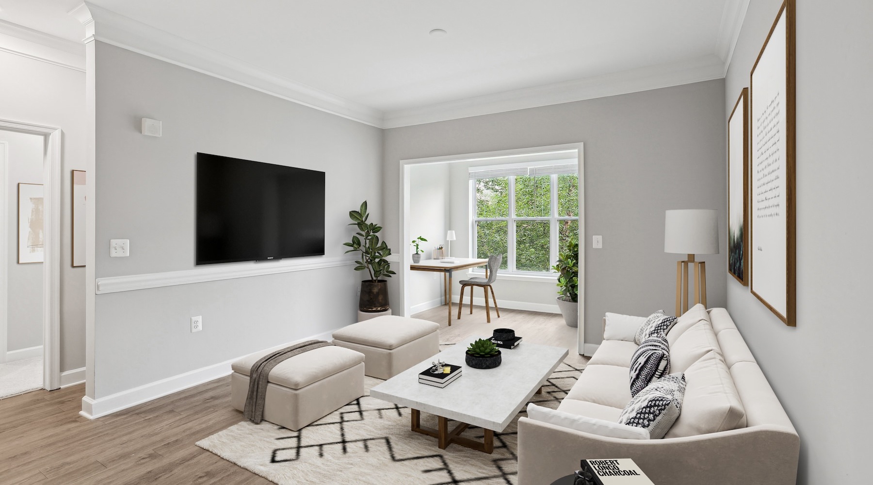 living room with a large couch and coffee table